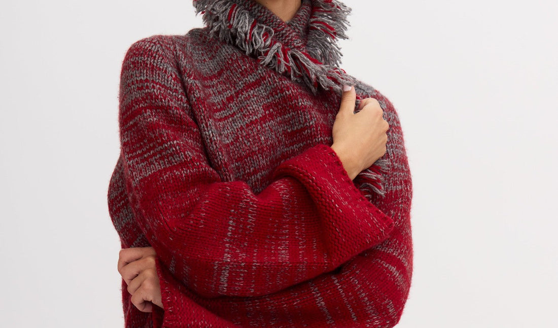 close up of red and grey knitted jacket