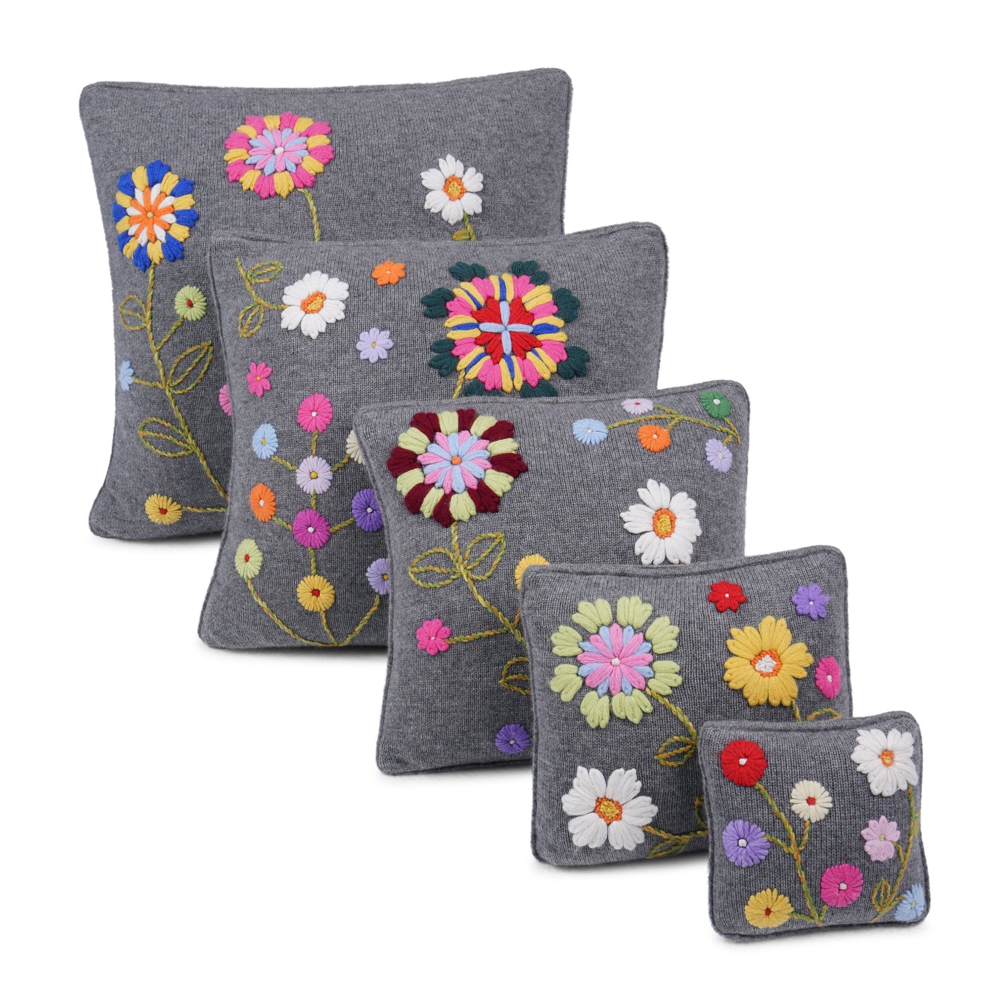 Set of five matching grey cashmere cushions in different sizes all with unique coloured floral hand embroidery.