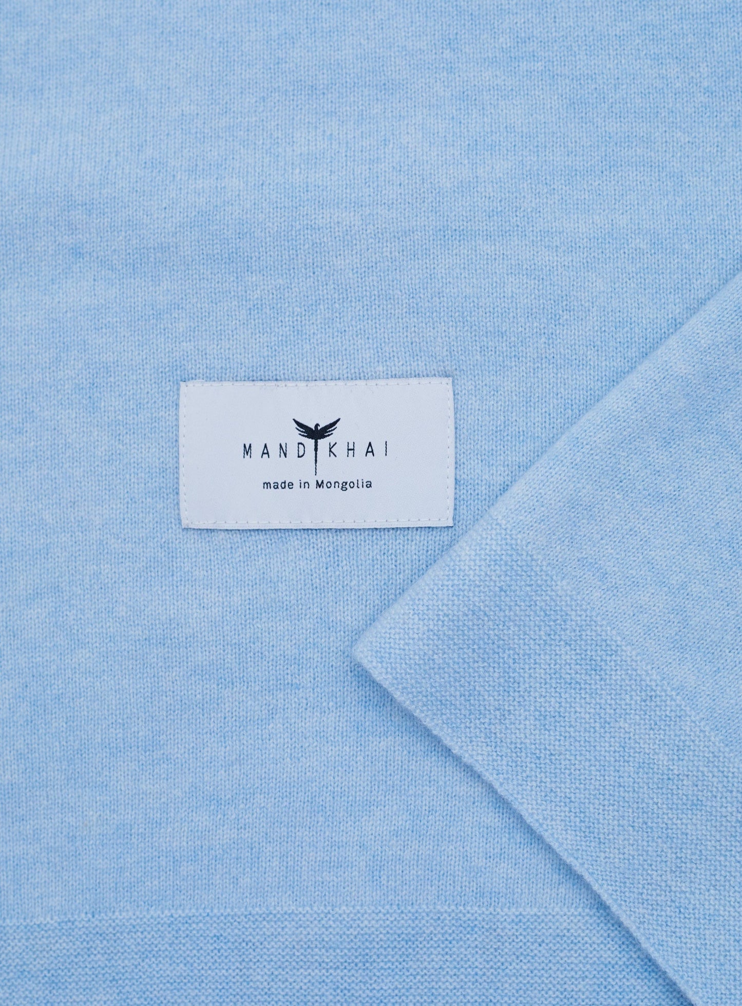 close up flat lay of the Light Blue Baby Cot Cashmere Blanket