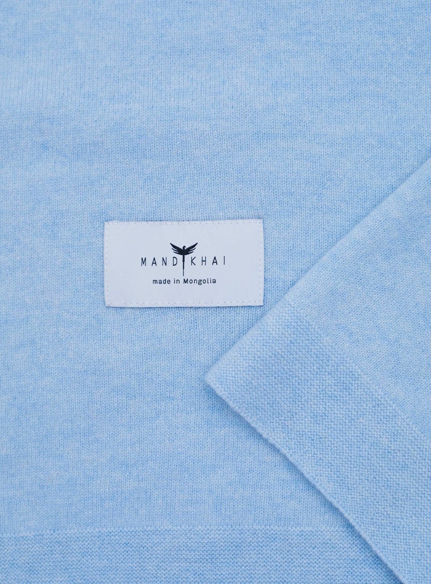 close up flat lay of the Light Blue Baby Cot Cashmere Blanket
