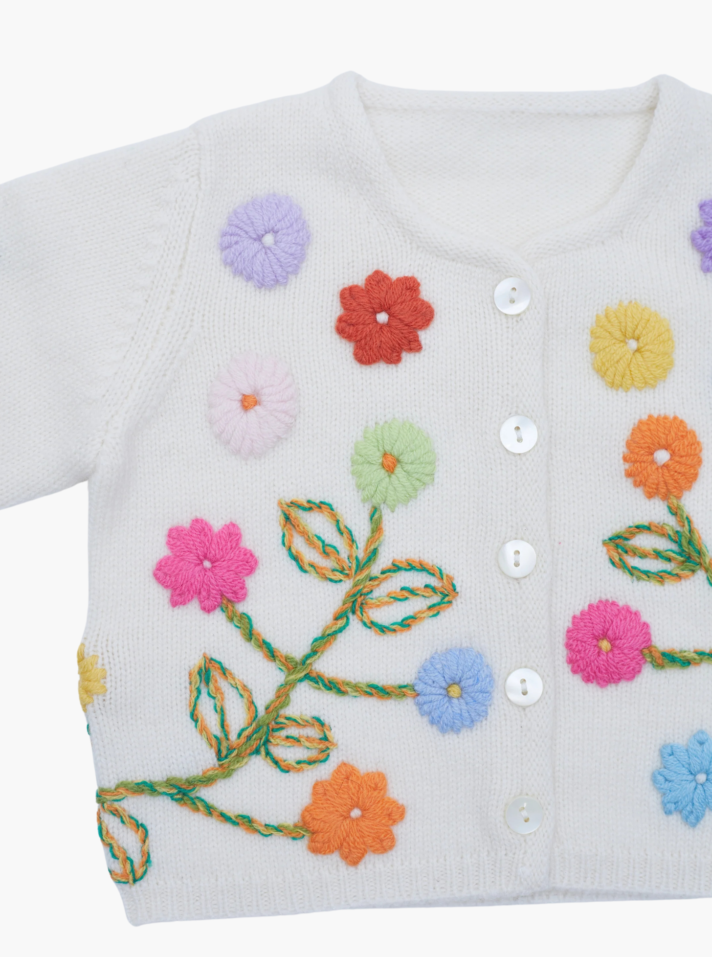 close up embroidered baby cashmere cardigan in white with multicolour flowers