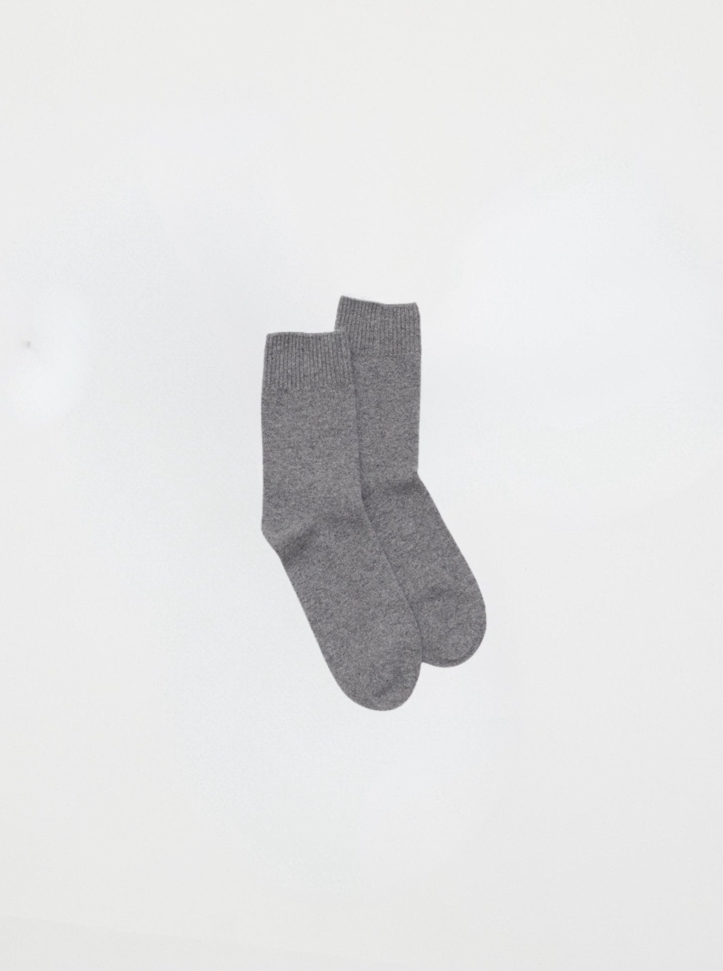 Front flat lay of ankle length grey Cashmere Socks