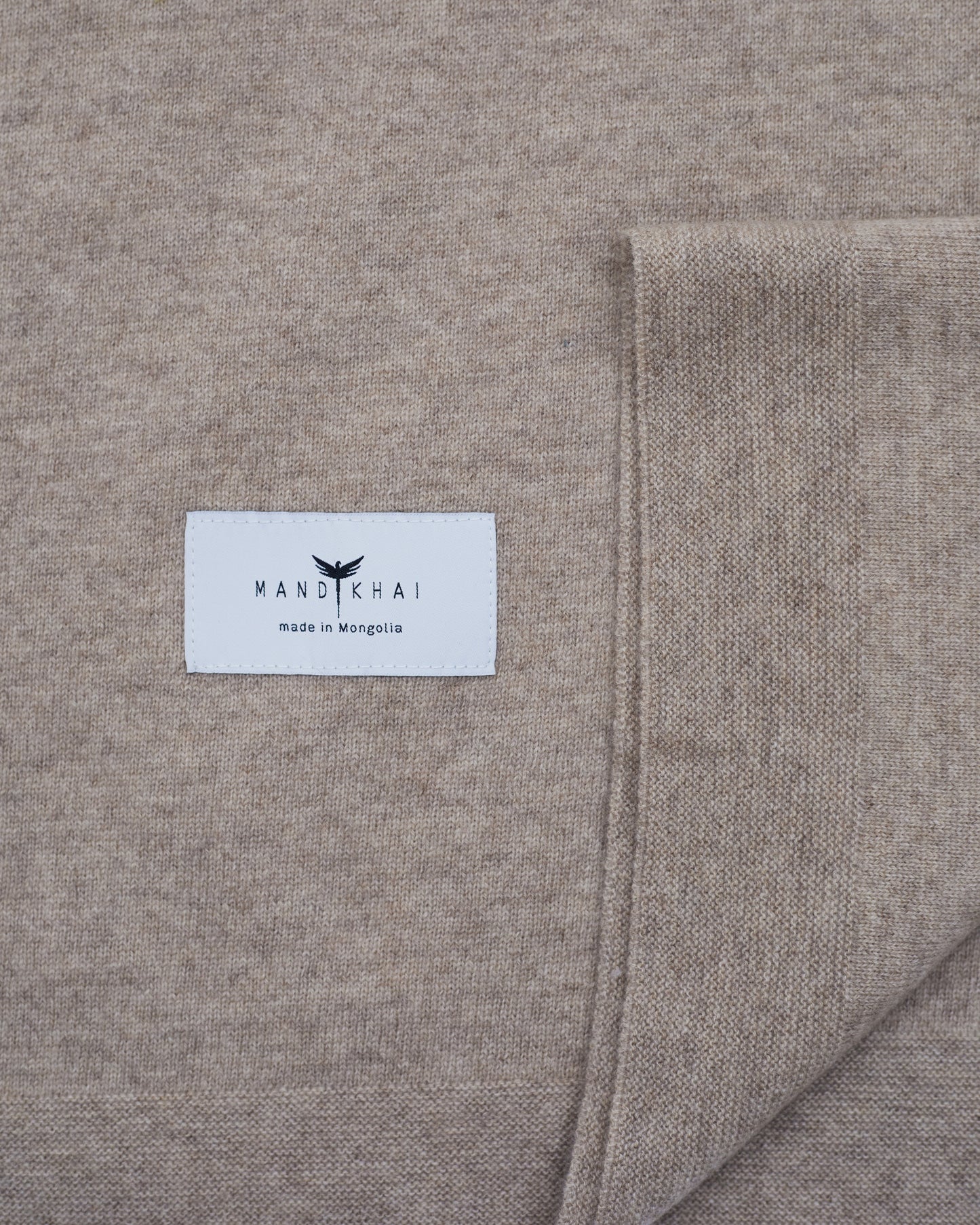 close up flat lay of the Light Brown Baby Cot Cashmere Blanket 