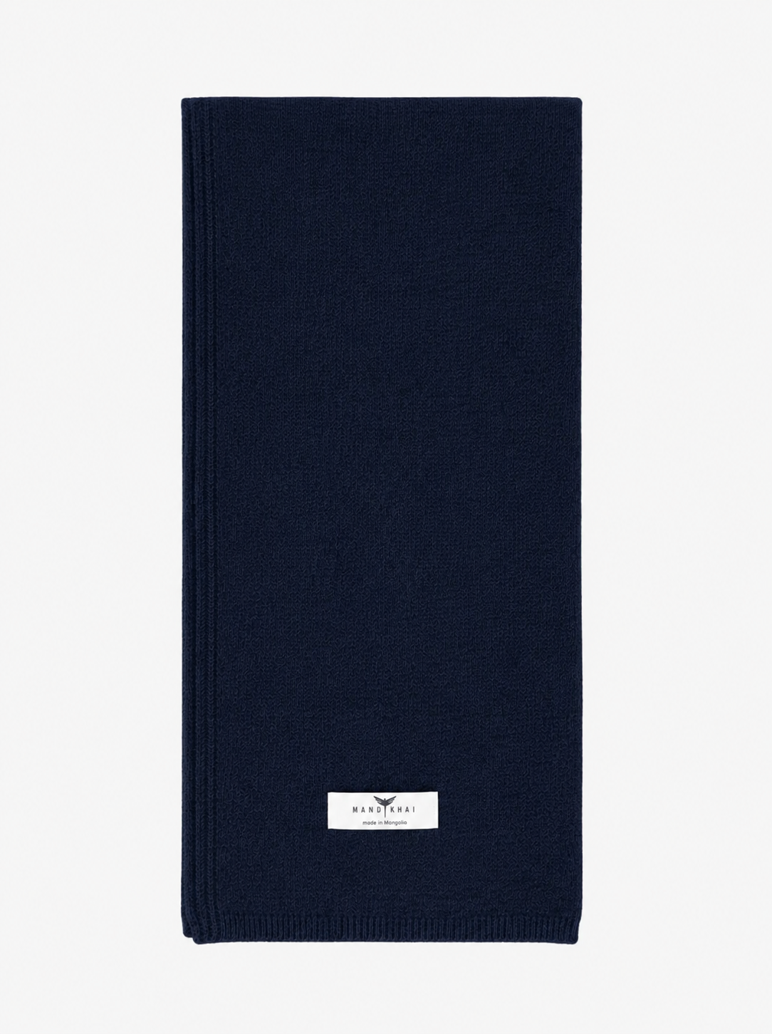A folded navy blue knit scarf with a small white brand label near the bottom, displayed against a clean white background.
