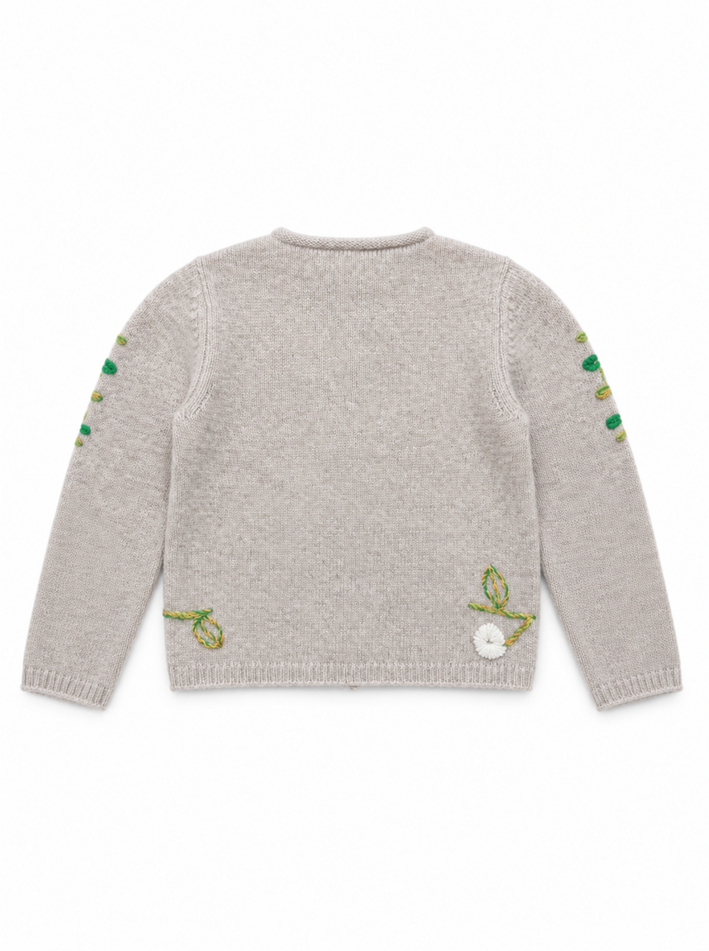 New beige knit cardigan sweater shown from the back, featuring green embroidered leaf and vine motifs along the sleeves and lower back, with a small white pom-pom detail.