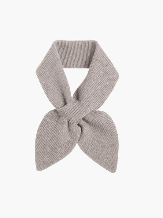 New beige knit scarf tied in a bow shape, displayed against a clean white background.