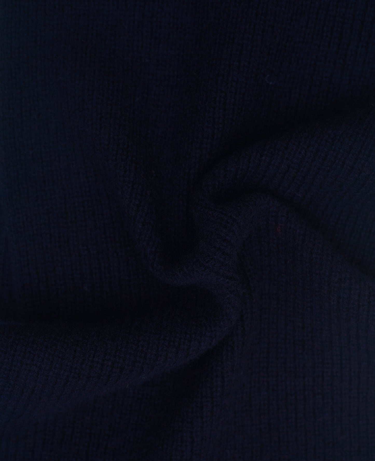 dark navy cashmere ribbed knit scarf close up detail of knit texture