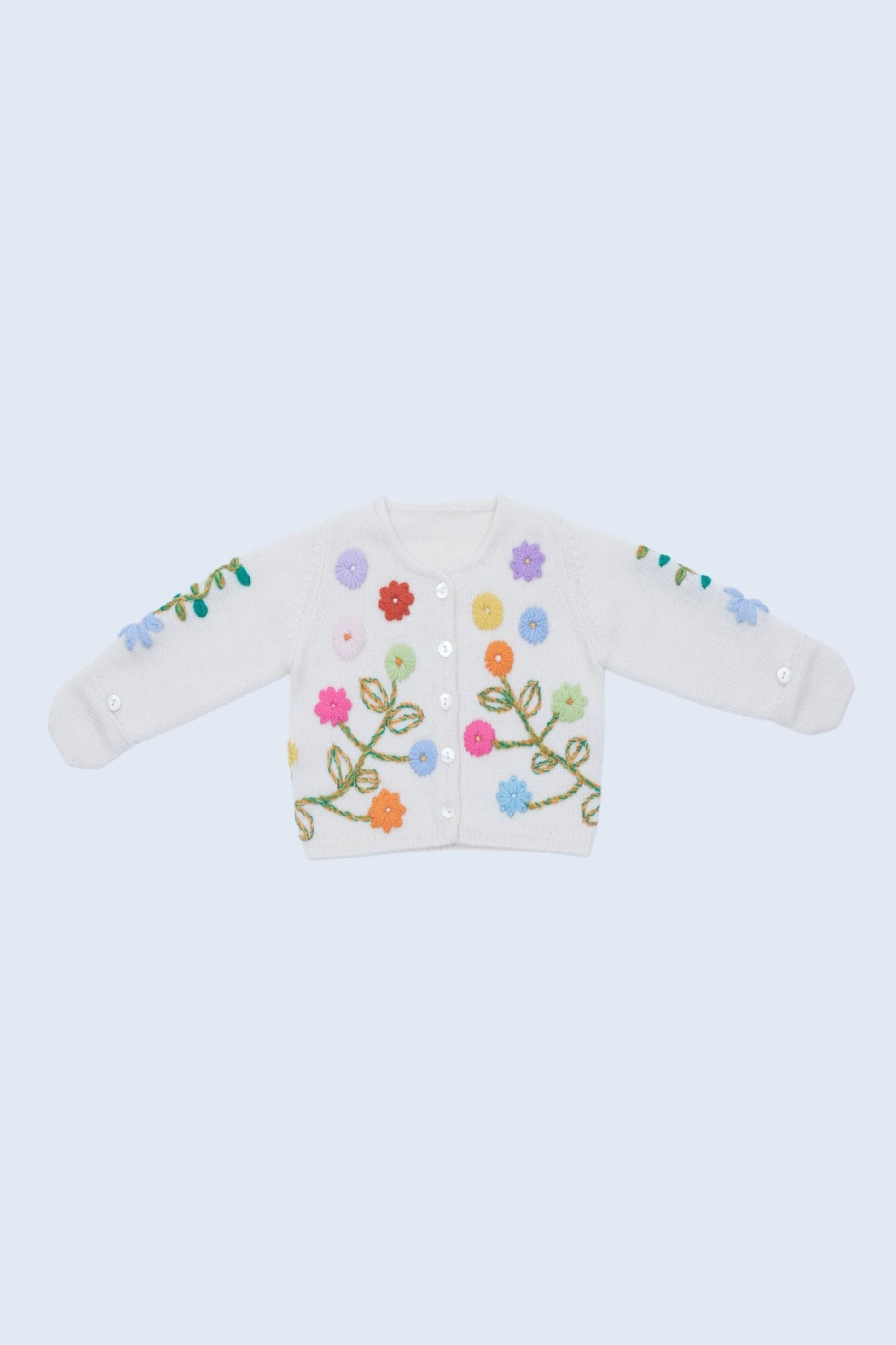 front flat lay of the embroidered baby cashmere cardigan in white with multicolour flowers 