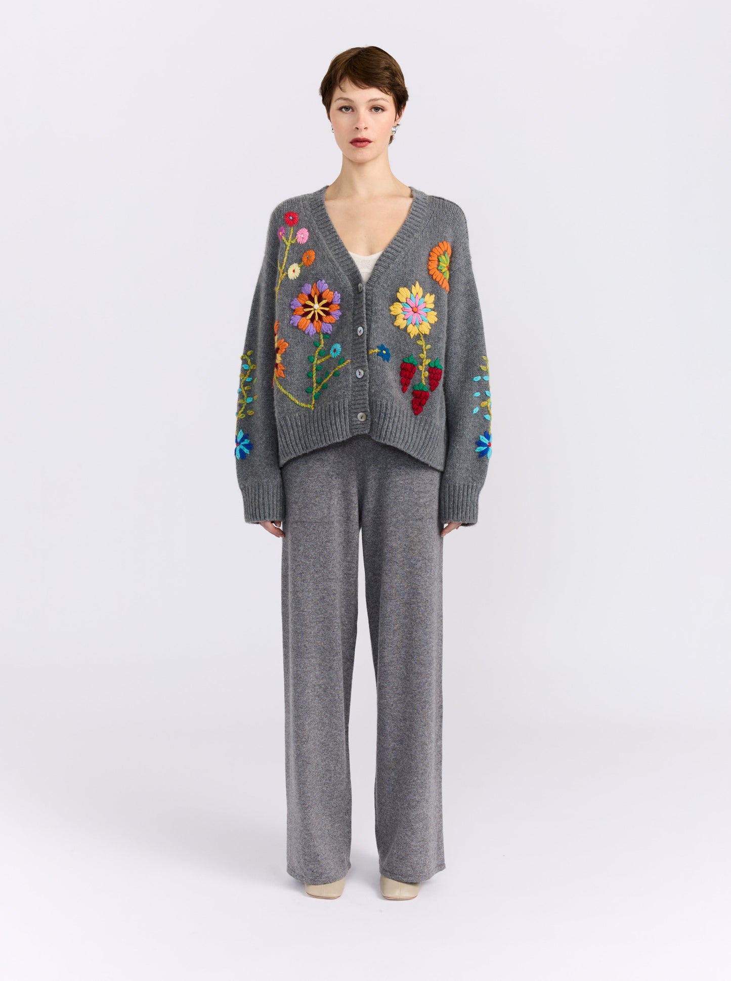 model wearing grey cashmere embroidered floral cardigan