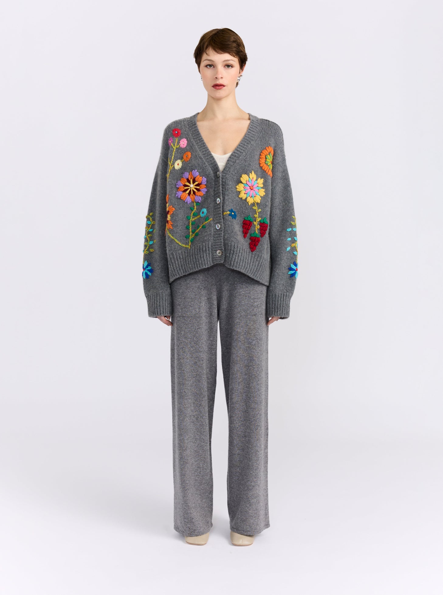 model wearing grey cashmere embroidered floral cardigan