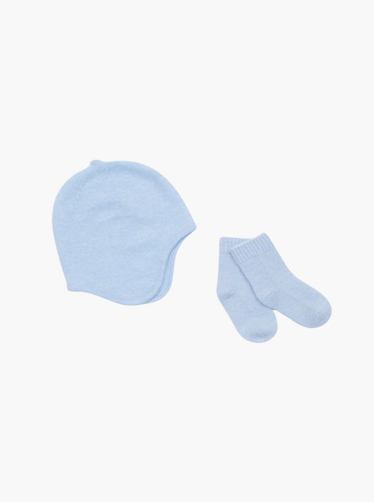 flat lay of the light blue cashmere baby hat and socks set