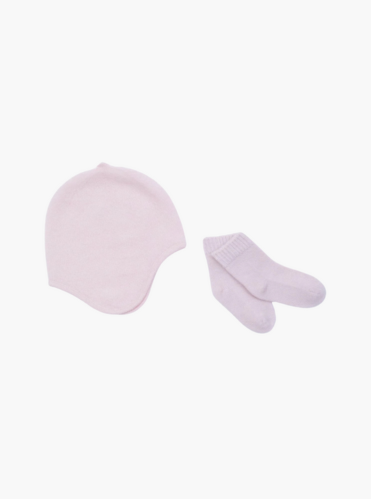 flat lay of the light pink cashmere baby hat and socks set