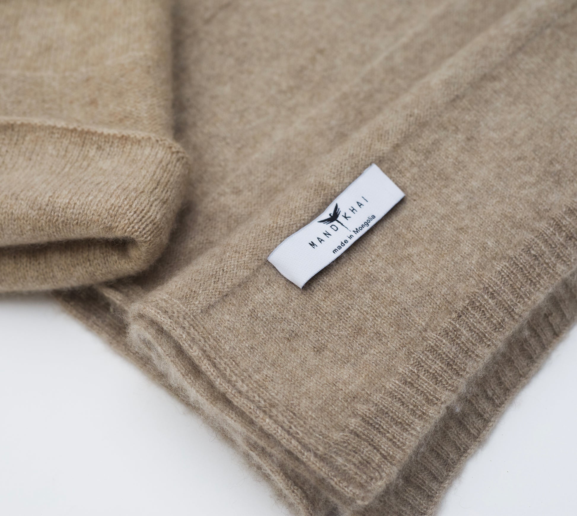 close up flat lay of the new beige banded stripe Cashmere Scarf and Beanie Set in a two way knit pattern beige 