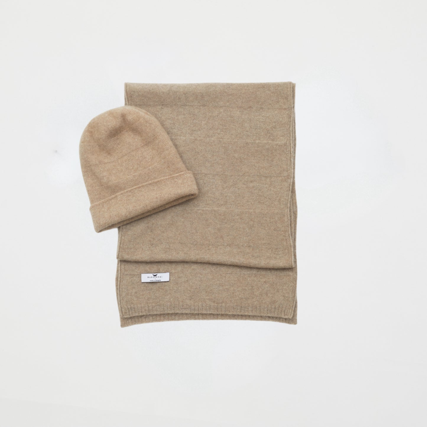 front flat lay of the new beige banded stripe Cashmere Scarf and Beanie Set in a two way knit pattern 