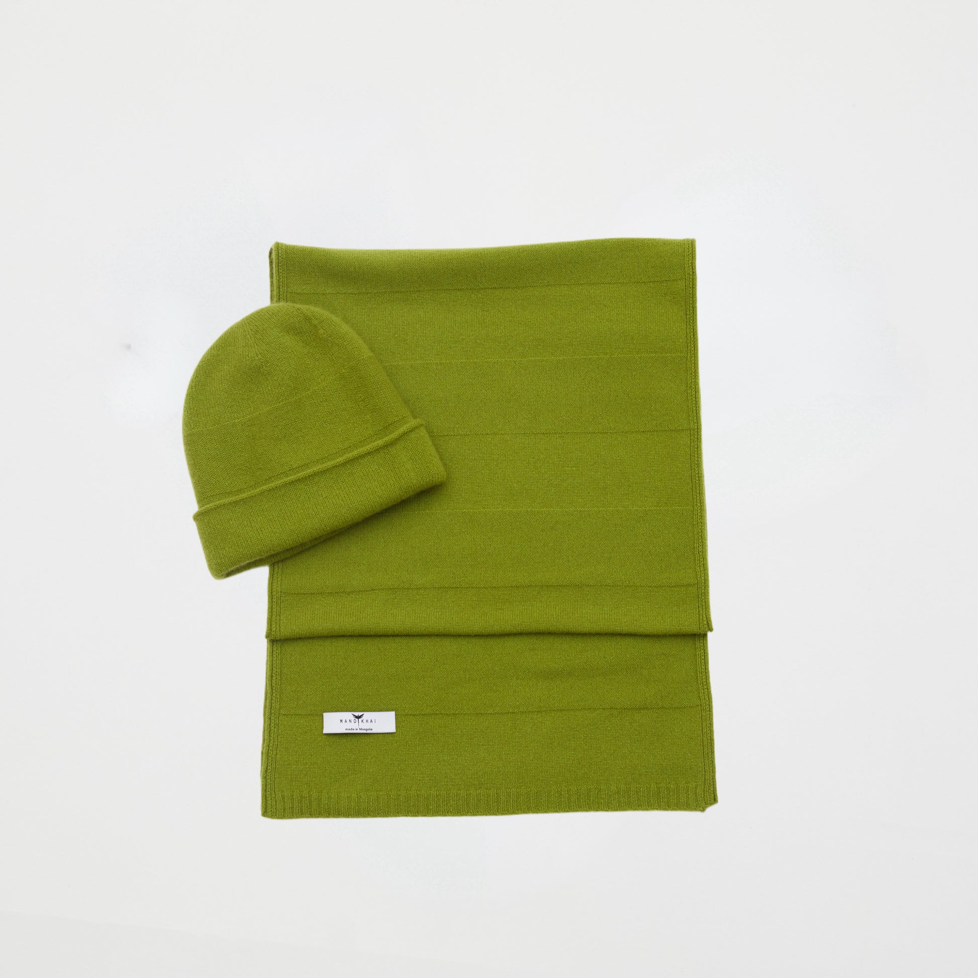 front flat lay of the olive green banded stripe Cashmere Scarf and Beanie Set in a two way knit pattern 