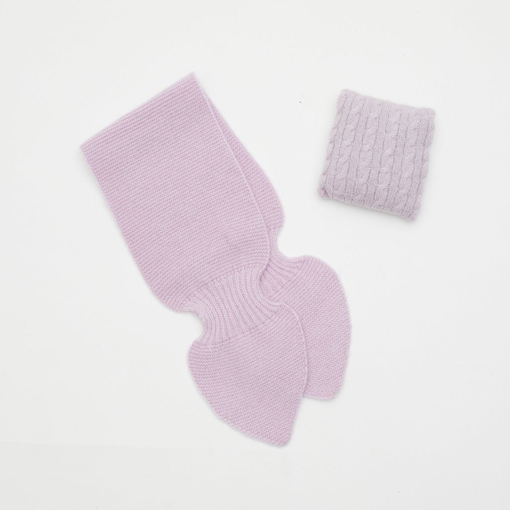 Flat lay of purple pink cashmere neck scarf and purple pink mini lavender cushion set 