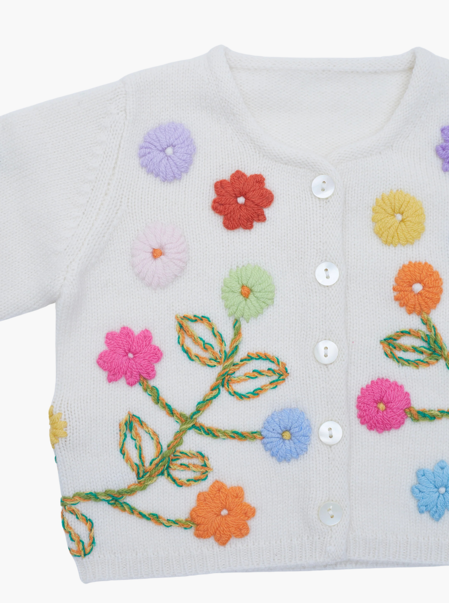 close up embroidered baby cashmere cardigan in white with multicolour flowers 