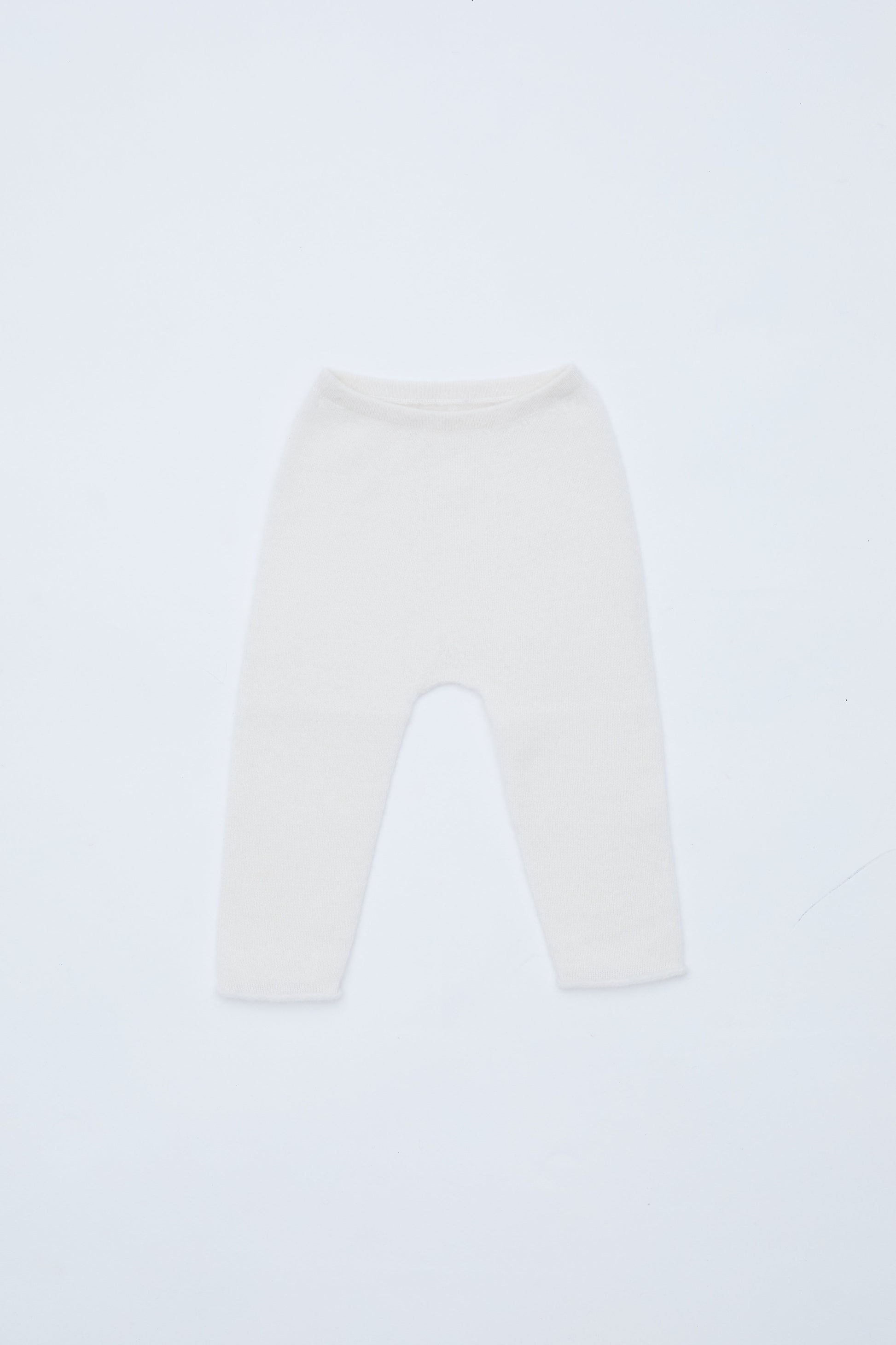 front flat lay of white baby cashmere leggings